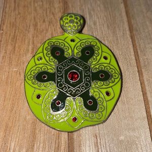 Hawaiian Silver tone turtle pendant with red stone accents